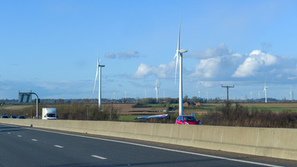 Fototapeta premium Windmill beside the road