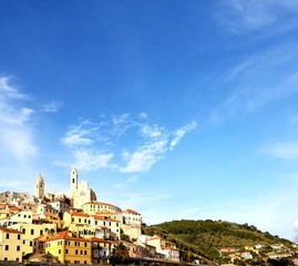 Obraz premium Cervo Ligure, Italy - 02/15/2020: Travelling around the Riviera Ligure in winter days. Beautiful photography of the small vilagges near the sea with typical old buildings.