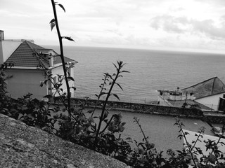 Cervo Ligure, Italy - 02/15/2020: Travelling around the Riviera Ligure in winter days. Beautiful photography of the small vilagges near the sea with typical old buildings.