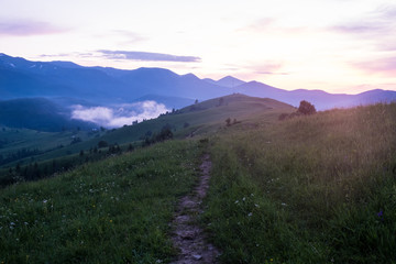 Obraz premium Majestic sunset in the mountains landscape. Nature summer landscape