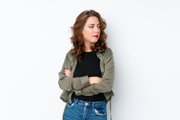 Fototapeta premium Young Russian woman over isolated white background with confuse face expression
