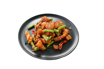 spicy stir fried crispy pork crackling with chili and ginger on plate