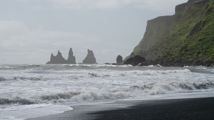 The black sand beach of Reynisfjara in the southern coast of Vik, Iceland.