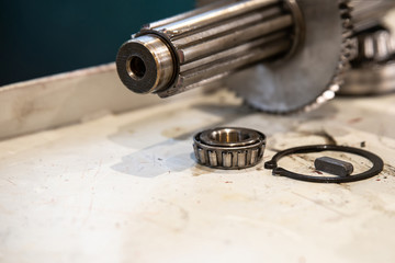 Splined shaft with bearing for repair of machine tool equipment.