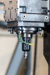 Spindle with a milling cutter in a mandrel on a CNC milling machine.