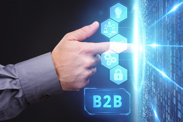 Business, Technology, Internet and network concept. Young businessman working on a virtual screen of the future and sees the inscription: