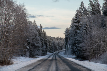 Winter country road in snowy winter day