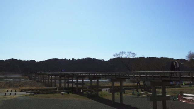 a houraibashi bridge, a long wooden bridge over the oi river in shimada city,
