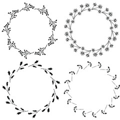 Fototapeta premium Hand drawn vector set of floral wreaths