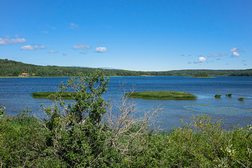Picturesque view of Lake Matapedia (Lac Matapedia) shore near the city of Amqui in Quebec, Canada.