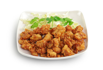 Close up deep fried chicken tendons with Fish Sauce isolated on white background with clipping path.