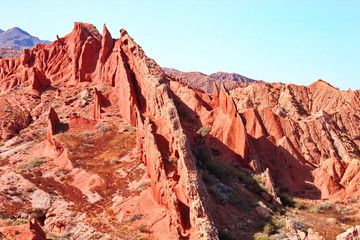 red cliffs in the canyon fairy tale, lake issycula, Kyrgyzia