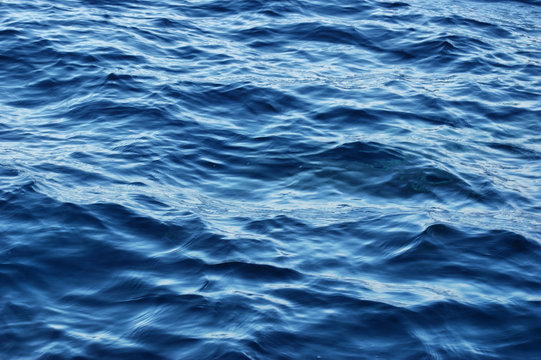 Texture of the surface of the blue ocean.