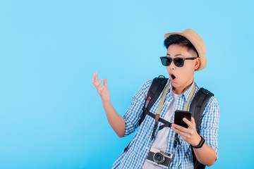 Asian backpacker travelers are shocked with discounted price tag on a blue background.