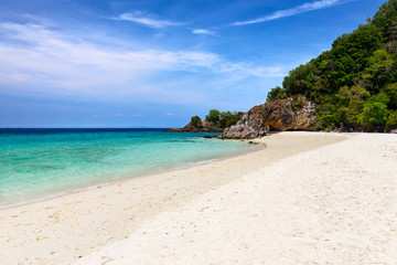 Fototapeta na wymiar Seascape at Khai Island, Satun, Thailand. Beautiful tropical beach under the summer clear blue sky.