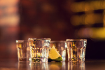 alcohol shots on wooden table