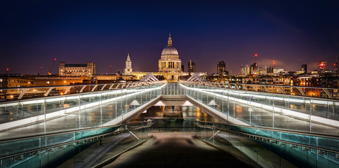 Millennium Bridge London with St. Paul's cathedral at night