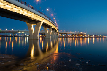 Fototapeta na wymiar bridge with lights at night Finnish bay