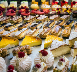 Sweet treats displayed in a French pastery shop.