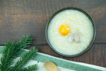Congee with minced pork and boiled egg