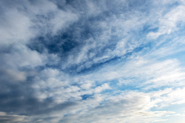 Backgrounds and textures. Blue beautiful sky with clouds.