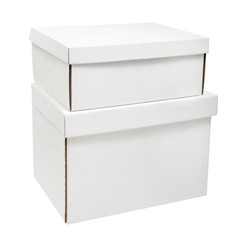 Two blank white corrugated cardboard boxes isolated on white background