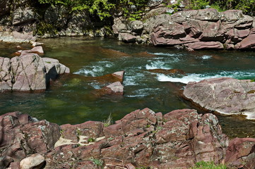 Wonderful nature with the mountain river Vit, which flows in a beautiful bed to big rocks and stones, Teteven, Bulgaria, Europe   