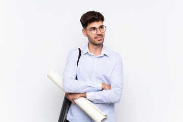 Young architect man over isolated white background looking to the side