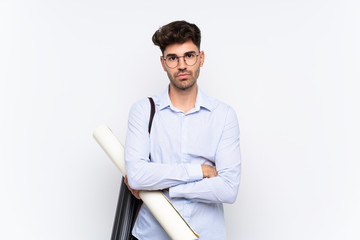 Young architect man over isolated white background keeping arms crossed