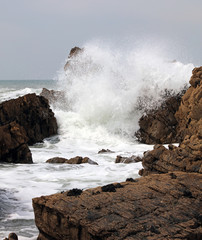 Sea breaking over rocks at Hartland Quay, Devon