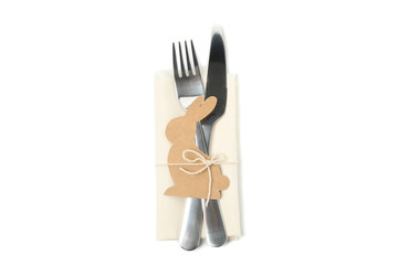Cutlery, napkin and decorative bunny isolated on white background