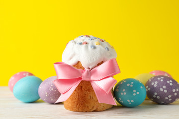 Composition with Easter cake on white wooden table, close up