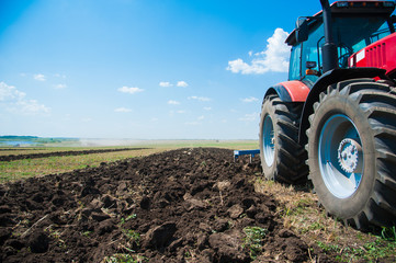 Tractor while plowing