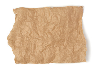 piece of crumpled brown paper isolated on white background