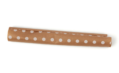 twisted white polka dot brown paper roll isolated on a white background
