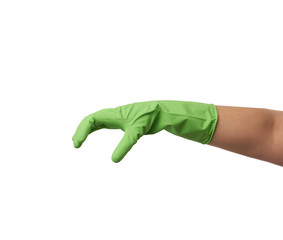 green rubber glove for cleaning is dressed on the hand