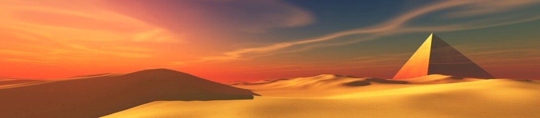 Desert panorama with pyramids at sunset