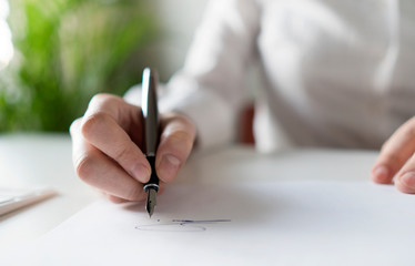 hand with pen
