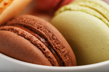 Macaron cookies with different color filling close-up, macro.