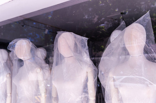 Boutique display window with mannequins