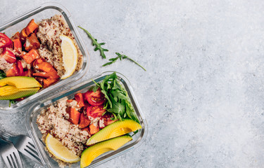 Vegetarian healthy meal prep containers . Raw vegetables and quinoa for lunch on light table. Vegan, healthy, detox food concept. Top view