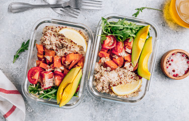 Vegetarian healthy meal prep containers . Raw vegetables and quinoa for lunch on light table. Vegan, healthy, detox food concept. Top view