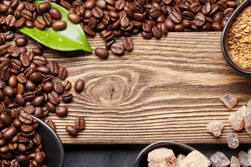 Coffee cup, sugar and roasted beans