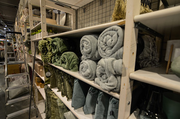 Ghent, Belgium, August 2019. A towel display at a shopping center.