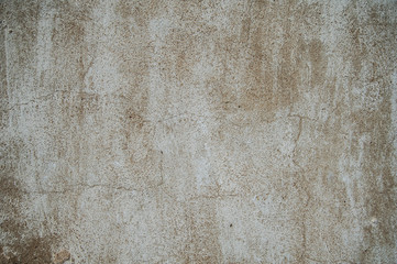 texture of the cement sand surface,background of an old concrete rough wall,beige texture of the cement surface,yellow concrete wall background with white streaks