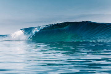 Ocean ideal wave in ocean. Breaking blue wave - obrazy, fototapety, plakaty