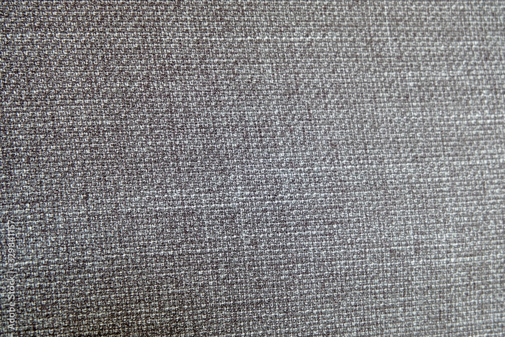 Wall mural Selective focus, Close up shot of dark grey formal suit cloth textile surface. wool fabric texture for important luxury evening or night event. Wallpaper and background with copy space for text