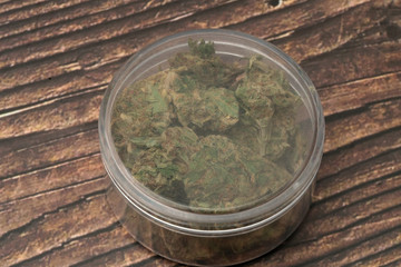 Marijuana cannabis Medicinal, weed joint In a glass container, drugs.