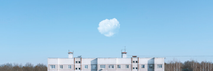Bright blue sky with house and white cloud. Great background with copyspace. Nature background. Lifestyle and climate change concept. Stock banner photo.