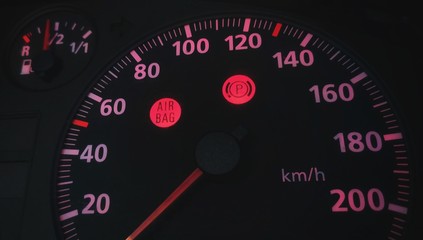 speedometer on black background